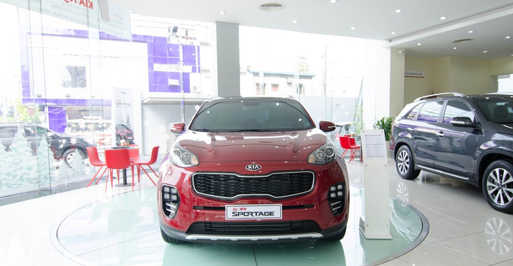 So sánh đầu xe Kia Sportage 2016 và Mitsubishi Outlander Sport 2016.