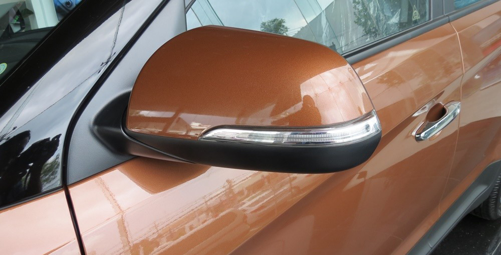 Đánh giá xe Hyundai Creta 2015 có gương chiếu hậu chỉnh/gập điện tích hợp báo rẽ.