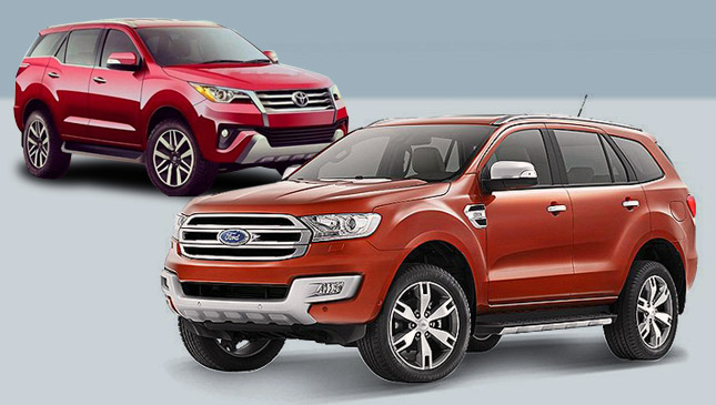 Toyota Fortuner đỏ và Ford Everest màu cam chụp từ phía trước 