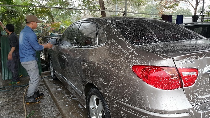 Giá rửa xe dịp gần Tết tăng chóng mặt.