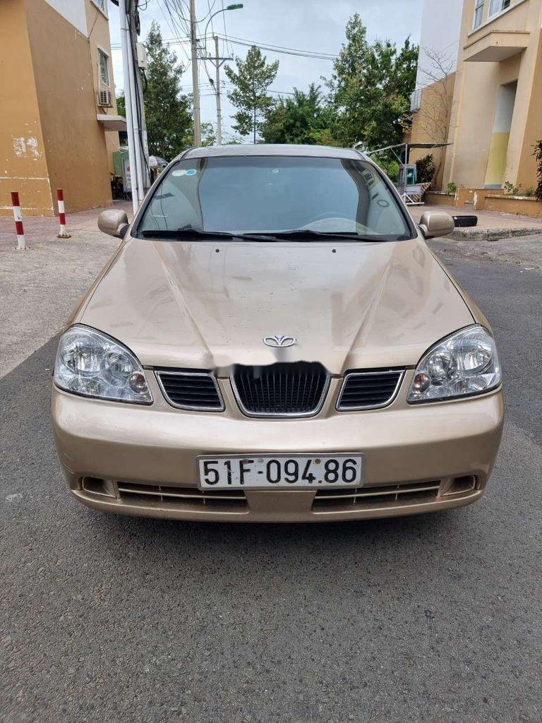 Cần bán Daewoo Lacetti đời 2005, màu vàng