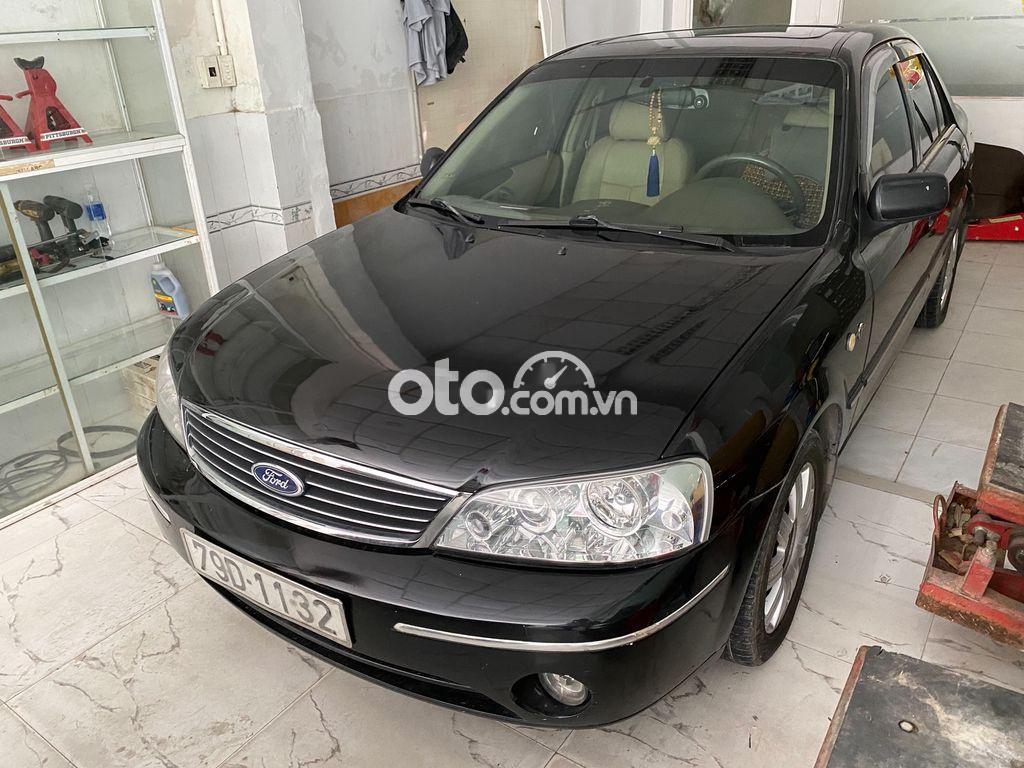 Bán xe Ford Laser năm 2004, màu đen, giá chỉ 145 triệu