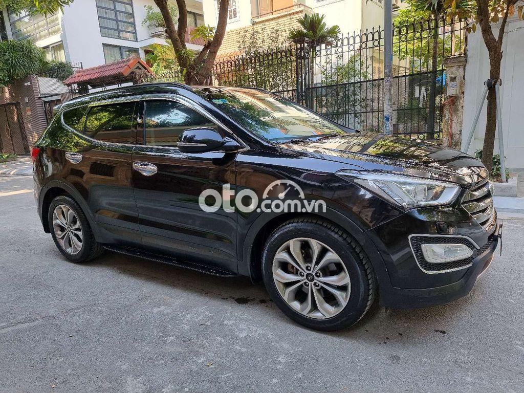 Cần bán xe Hyundai Santa Fe 2.2 AT sản xuất 2015, màu đen chính chủ giá cạnh tranh