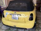 xe Minicooper mui trần màu vàng 2 cửa