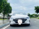 Ông anh cần bán gấp Elantra số sàn màu Trắng