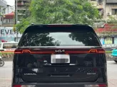 Kia Carnival 2.2D Signature 2022 - Xe màu đen nội thất nâu sang trọng