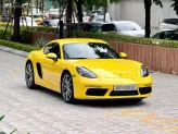 Porsche Cayman 2021 - Xe màu vàng nội thất đen