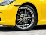Porsche Cayman 2021 - Xe màu vàng nội thất đen