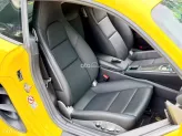 Porsche Cayman 2021 - Xe màu vàng nội thất đen