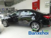 Công ty TNHH MTV Toyota Phú Mỹ Hưng cần bán Toyota Corolla Altis G 1.8 At sản xuất 2015, màu đen, giá 815Tr