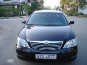 Cần bán xe Toyota Camry đời 2004, màu đen số sàn