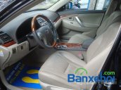 Auto Gia Bảo cần bán lại xe Toyota Camry 2.0E đời 2011, màu đen đã đi 33000 km