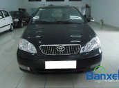 Xe Toyota Corolla J 2003 cũ màu đen đang được bán với giá 285000000 vnd