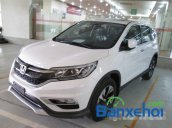 Bán xe Honda CR V 2.4L sản xuất 2015, màu trắng. Xe sử dụng nhiên liệu xăng