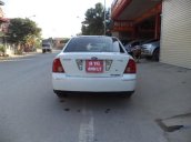 Cần bán xe Ford Laser đời 2004, màu trắng, số sàn, xe đẹp