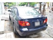 Bán xe Toyota Altis 1.8, đời cuối 2003, số sàn, màu xanh ghi, mâm đúc