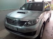 Cần bán Toyota Fortuner G số sàn máy dầu SX 2014 màu bạc, xe còn mới 99%