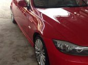 Cần bán BMW 320i đời 2010, màu đỏ, nhập khẩu, số tự động 