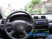 Nhà có xe Mazda 323 đời 1999 xe còn chất, rất đẹp