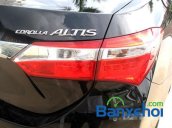 Cần bán xe Toyota Corolla altis 1.8CVT đời 2015, màu đen, giá 795 triệu