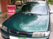 Nhà có xe Mazda 323 đời 1999 xe còn chất, rất đẹp