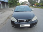 Gia đình cần bán xe Corolla Altis 1.8 số tay 2003 chính chủ mầu đen