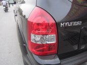 Bán xe Hyundai Tucson đời 2010, màu đen, xe nhập