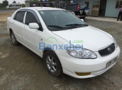 Cần bán xe Toyota Corolla J, màu trắng, sản xuất năm 2003