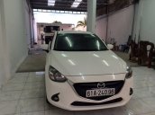 Bán Mazda 2 đời 2015, màu trắng, nhập khẩu, như mới, giá 655tr