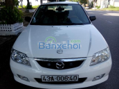 Cần bán lại xe Mazda 323 đời 2003, màu trắng, xe nhập