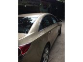 Chevrolet Cruze MT 2013 màu vàng cát, kính bấm điện, nội thất da, 4 vỏ zin theo xe