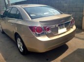 Chevrolet Cruze MT 2013 màu vàng cát, kính bấm điện, nội thất da, 4 vỏ zin theo xe