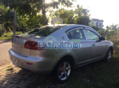 Cần bán Mazda 3 đời 2005, màu bạc, xe nhập, số tự động