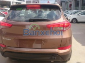 Hyundai Tucson 2015 màu vàng cát