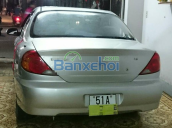 Cần bán Kia Spectra đời 2004, màu bạc, nhập khẩu, xe gia đình