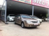 Daewoo Lacetti màu vàng cát, số sàn, máy xăng, SX 2010, đăng ký 2011