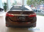 Cần bán Toyota Corolla altis đời 2014, màu nâu giá 944 triệu