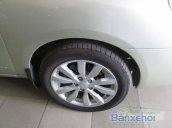 Xe Kia Carens 1.8 2012 cũ màu vàng đang được bán