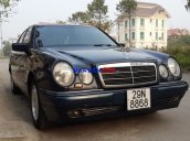 Bán Mercedes E230 1998, màu đen, xe nhập