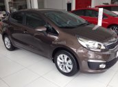 Cần bán Kia Rio 1.4 MT đời 2016, màu nâu, nhập khẩu chính hãng, giá tốt trong tháng