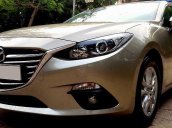 Cần bán xe Mazda 3 sedan đời 2015, màu vàng