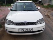 Cần bán lại xe Ford Laser Ghia 1.8 MT đời 2003, màu trắng xe gia đình