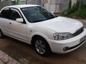 Cần bán lại xe Ford Laser Ghia 1.8 MT đời 2003, màu trắng xe gia đình