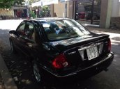 Cần bán xe cũ Ford Laser 1.8MT đời 2003, màu đen chính chủ