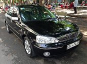 Cần bán xe cũ Ford Laser 1.8MT đời 2003, màu đen chính chủ