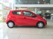 Cần bán Chevrolet Spark Duo 1.2L đời 2016, màu đỏ 