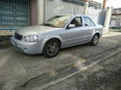 Kẹt tiền bán gấp Ford Laser đời 2004, màu bạc