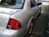 Kẹt tiền bán gấp Ford Laser đời 2004, màu bạc