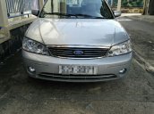 Kẹt tiền bán gấp Ford Laser đời 2004, màu bạc