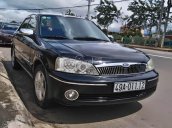 Cần bán gấp Ford Laser 1.8MT sản xuất 2003, màu đen như mới